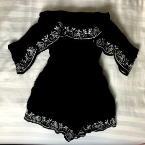 Black and white embroidered romper